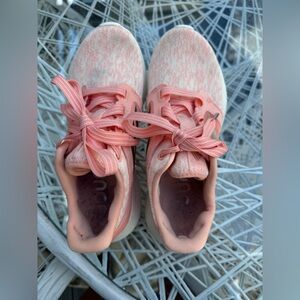 Adidas pink sneakers.